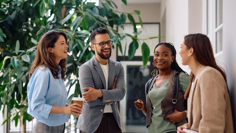 Facilities and operations team collaborating in a modern office